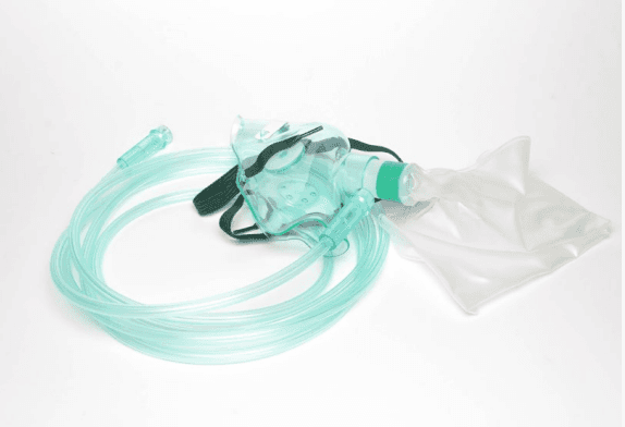 Oxygen mask with connected tubing on a white background.